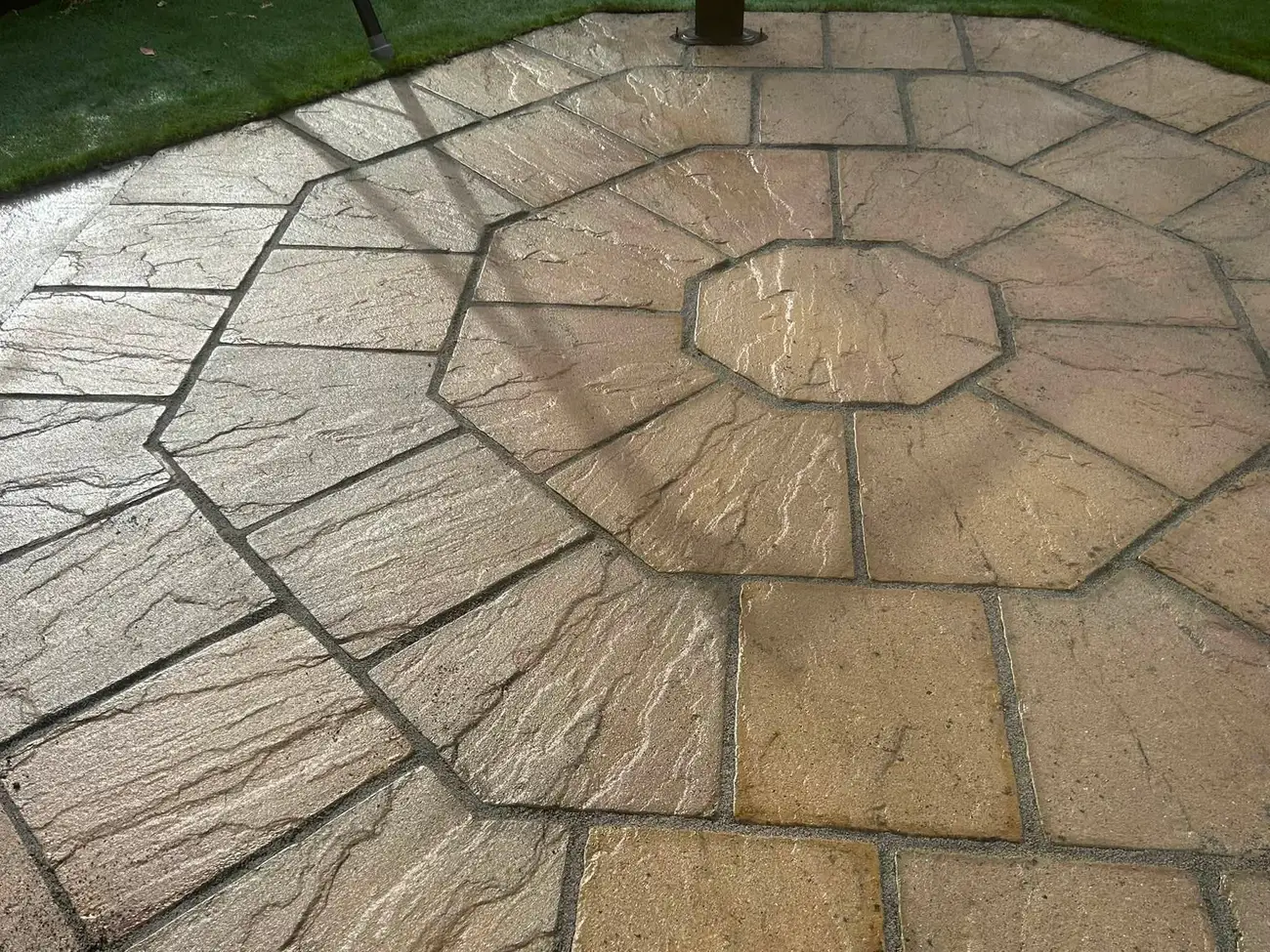 Octagonal patio feature cleaned and restored by Top Gun & Son