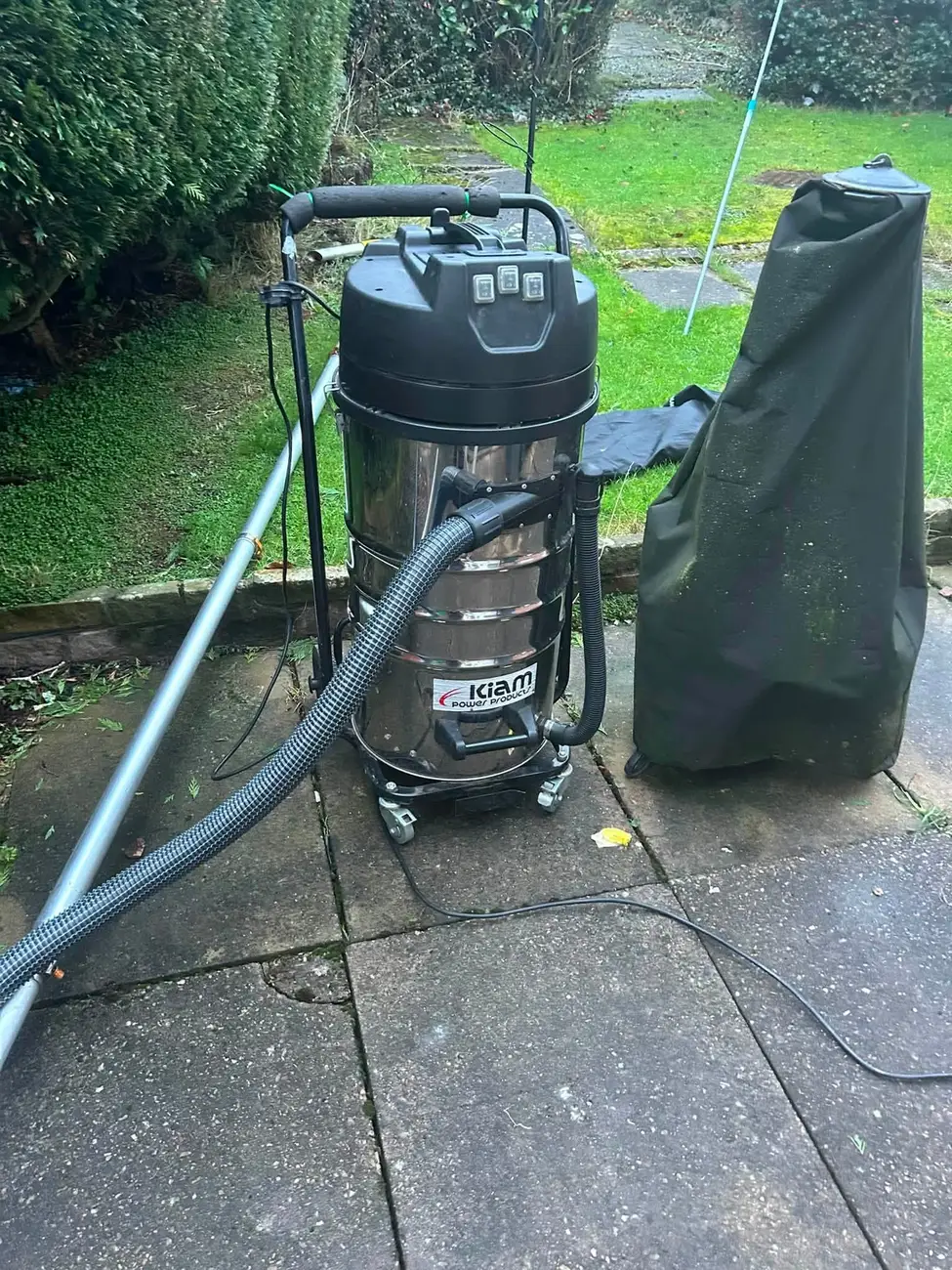 Professional gutter vacuum equipment used by Top Gun & Son